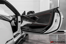 Load image into Gallery viewer, CCS C8 CORVETTE CARBON FIBER DOOR KICK PANEL OVERLAY
