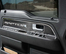 Load image into Gallery viewer, 2009-2014 FORD RAPTOR/F-150 - CARBON FIBER FRONT DOOR PANEL INSERTS 2PC | CHOOSE RAPTOR LETTERING OR PLAIN | Raptor Lettering
