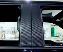 Load image into Gallery viewer, 2009-2014 FORD F-150/RAPTOR - PILLAR POSTS W/CARBON FIBER WRAP 4PC | STAINLESS STEEL/VINYL
