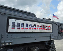 Load image into Gallery viewer, TAILGATE PLATE INSERT-BLACK ABS BACKING W/BRUSHED TOP PLATE (HUMMER STYLE W/AMERICAN FLAG)
